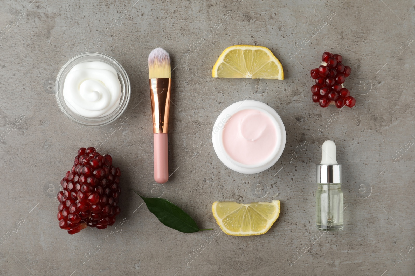 Photo of Flat lay composition with natural pomegranate facial mask on light grey table