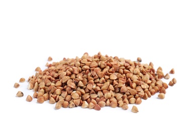 Photo of Uncooked buckwheat on white background. Healthy diet