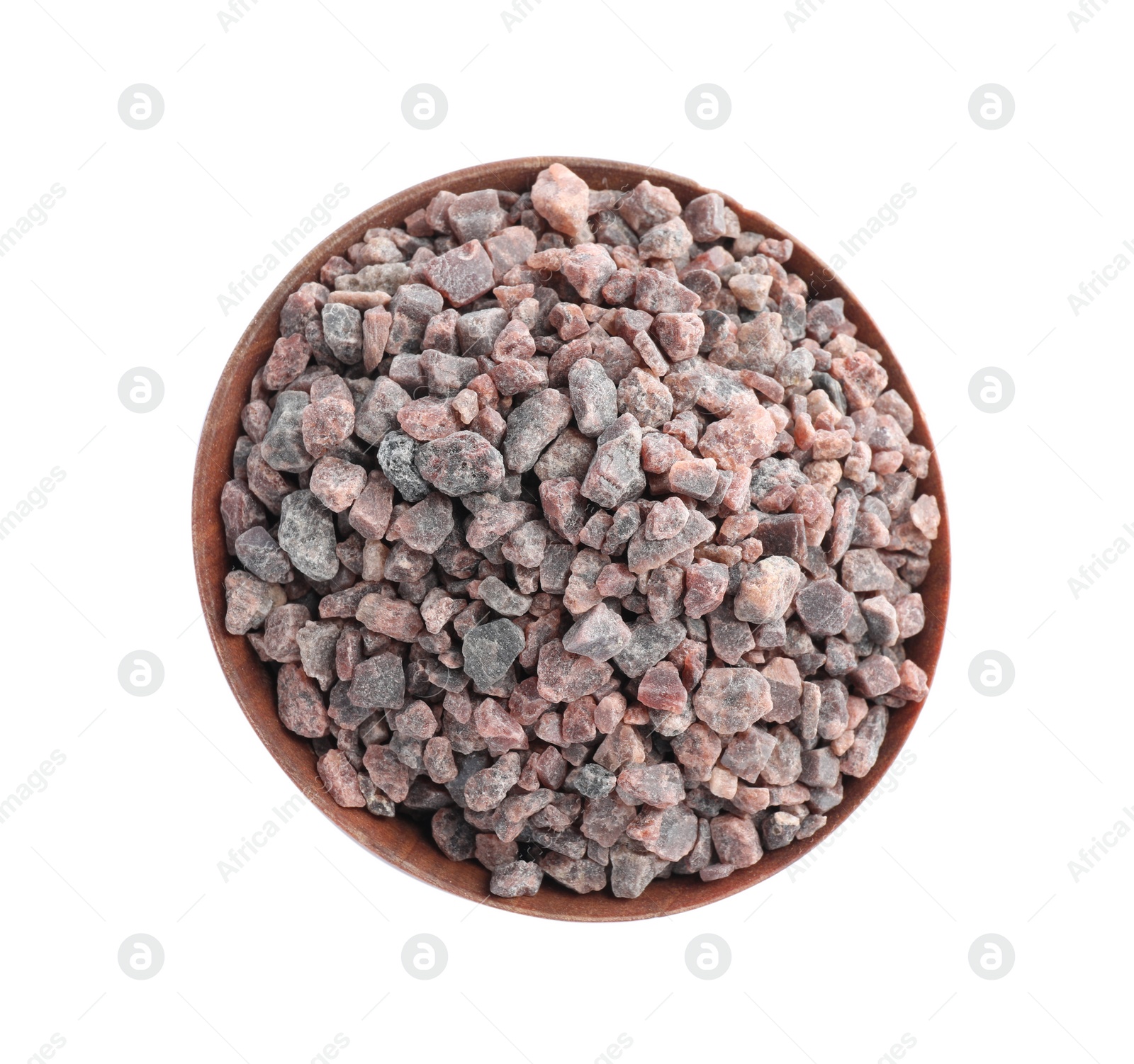 Photo of Black salt in wooden bowl isolated on white, top view