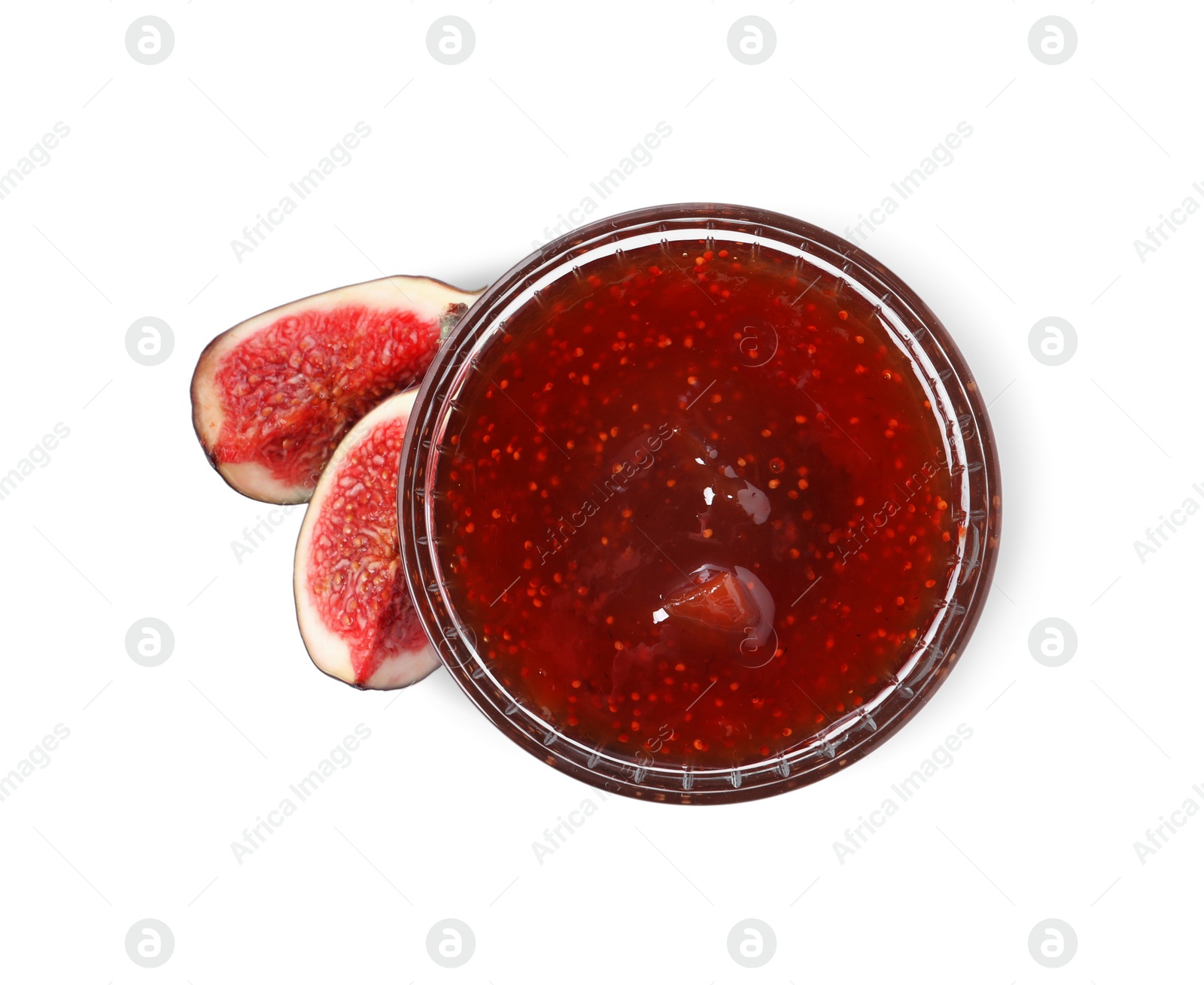 Photo of Glass bowl of tasty sweet jam and cut fresh fig isolated on white, top view