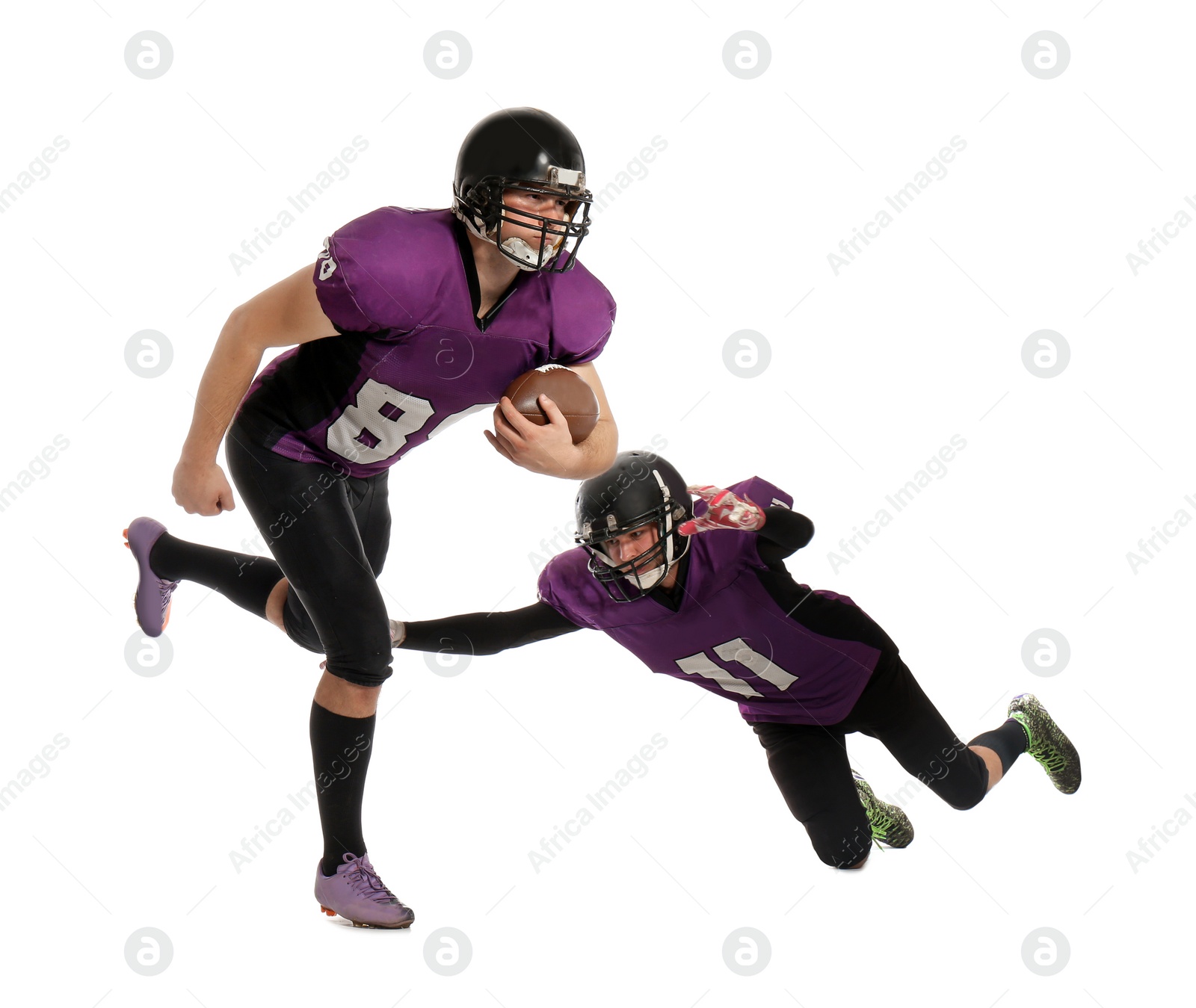 Photo of Men in uniform playing American football on white background