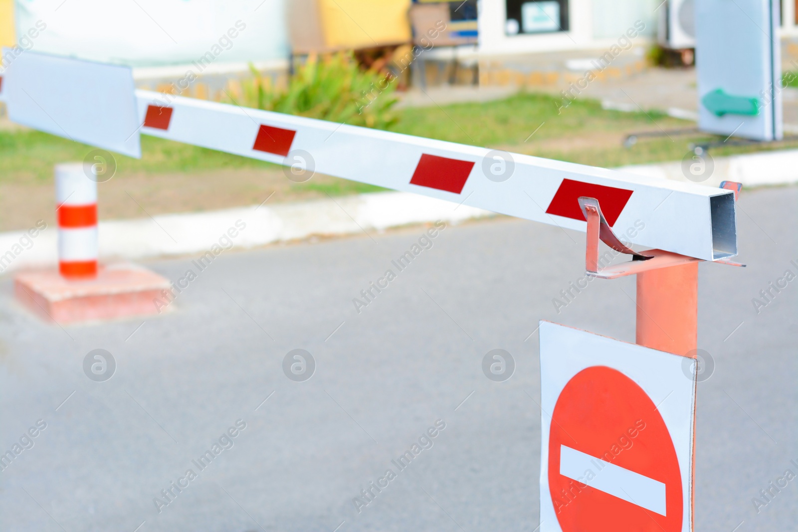 Photo of Boom barrier with sign Road closed outdoors