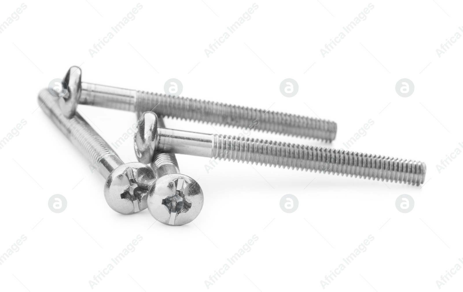 Photo of Metal bolts isolated on white. Hardware tool