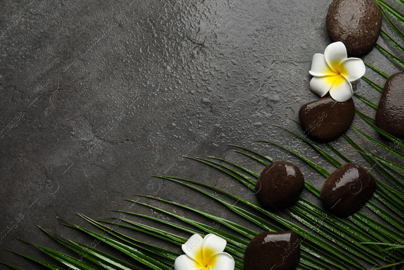 Photo of Flat lay composition with stones on grey background, space for text. Zen concept