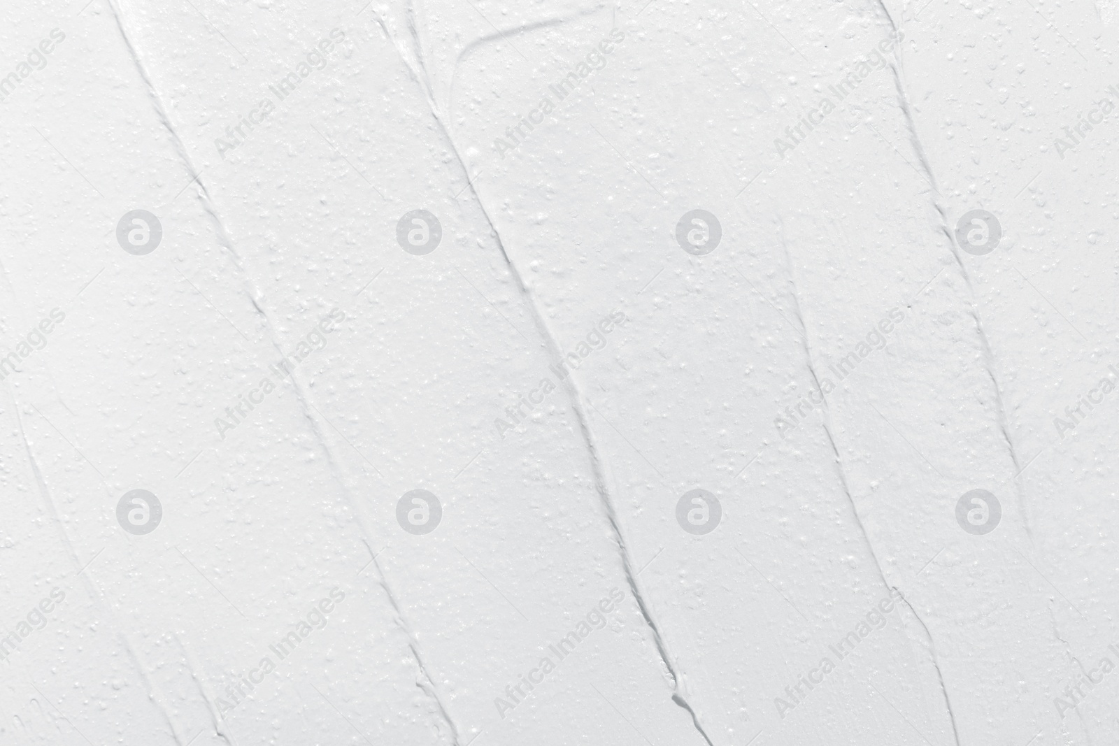 Image of Texture of white cream as background, closeup