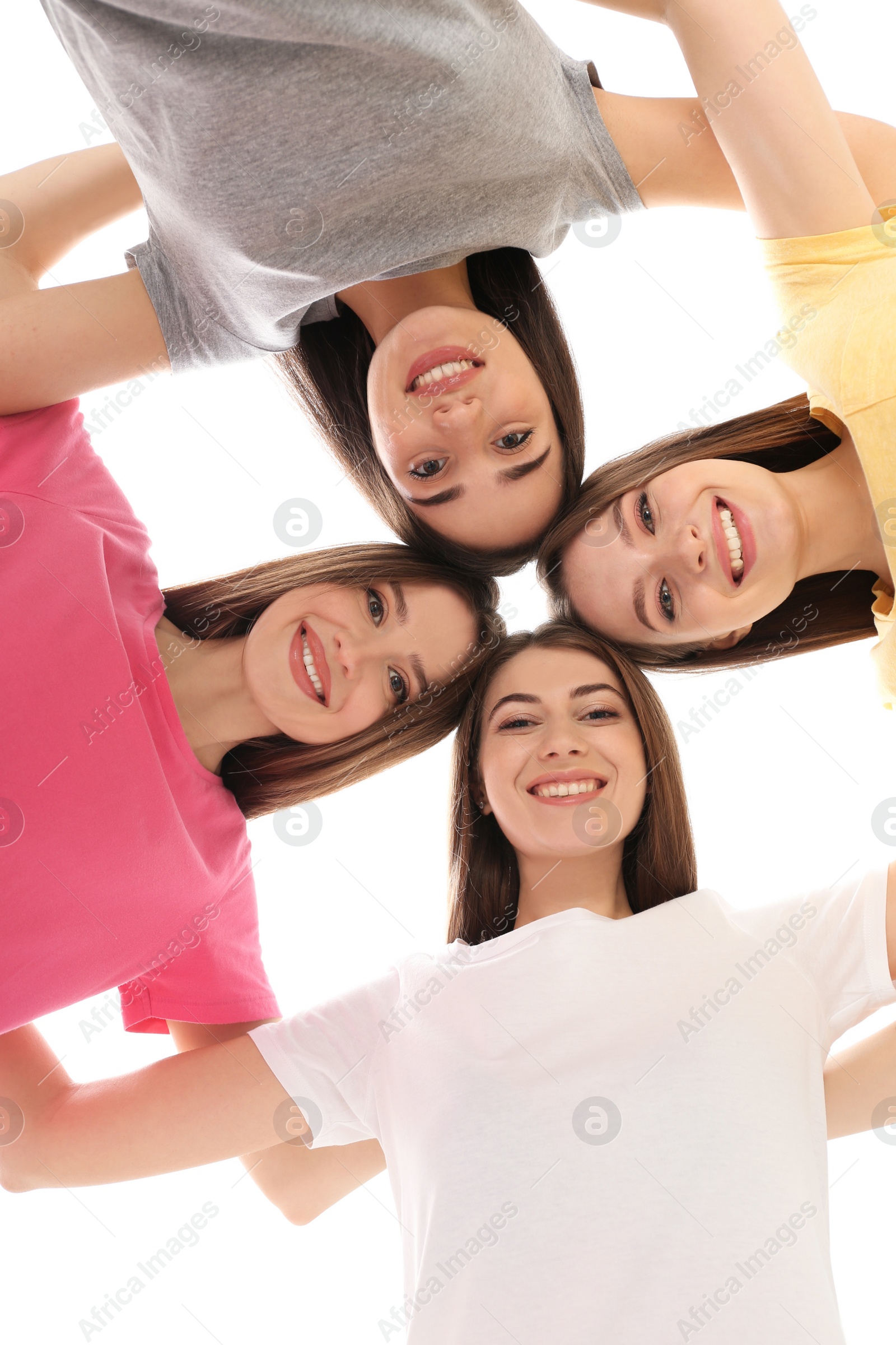 Photo of Beautiful young ladies hugging, bottom view. Woman's Day