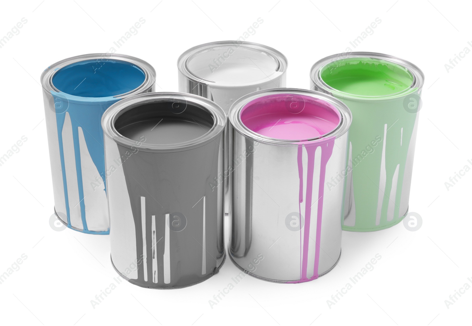 Photo of Cans of colorful paints isolated on white