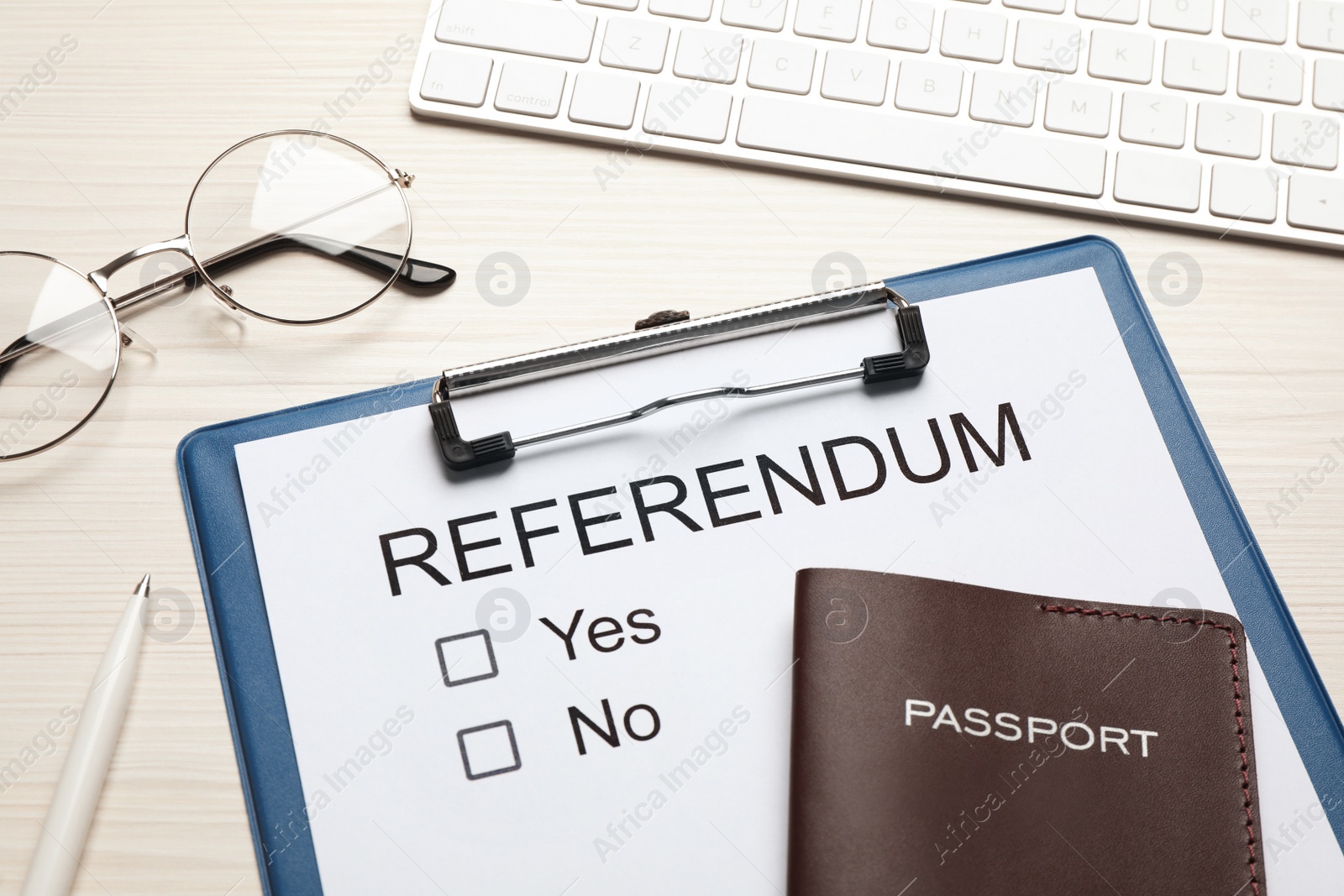 Photo of Composition with referendum ballot on white wooden table