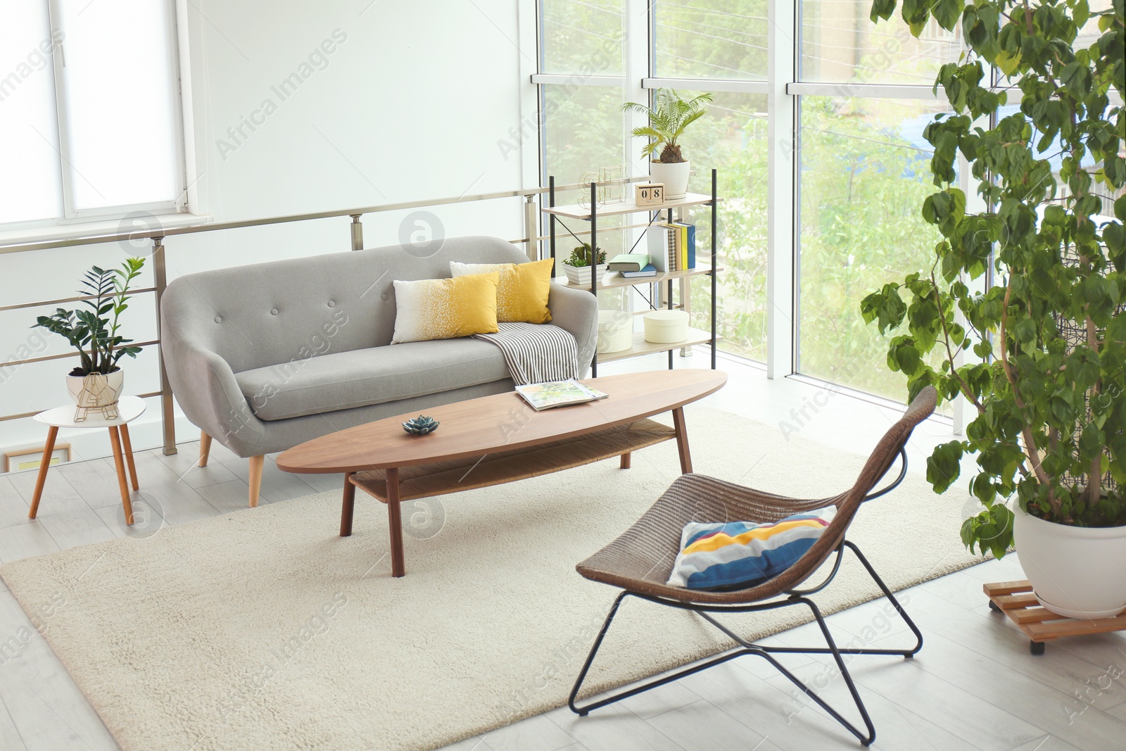 Photo of Elegant living room interior with comfortable sofa and coffee table