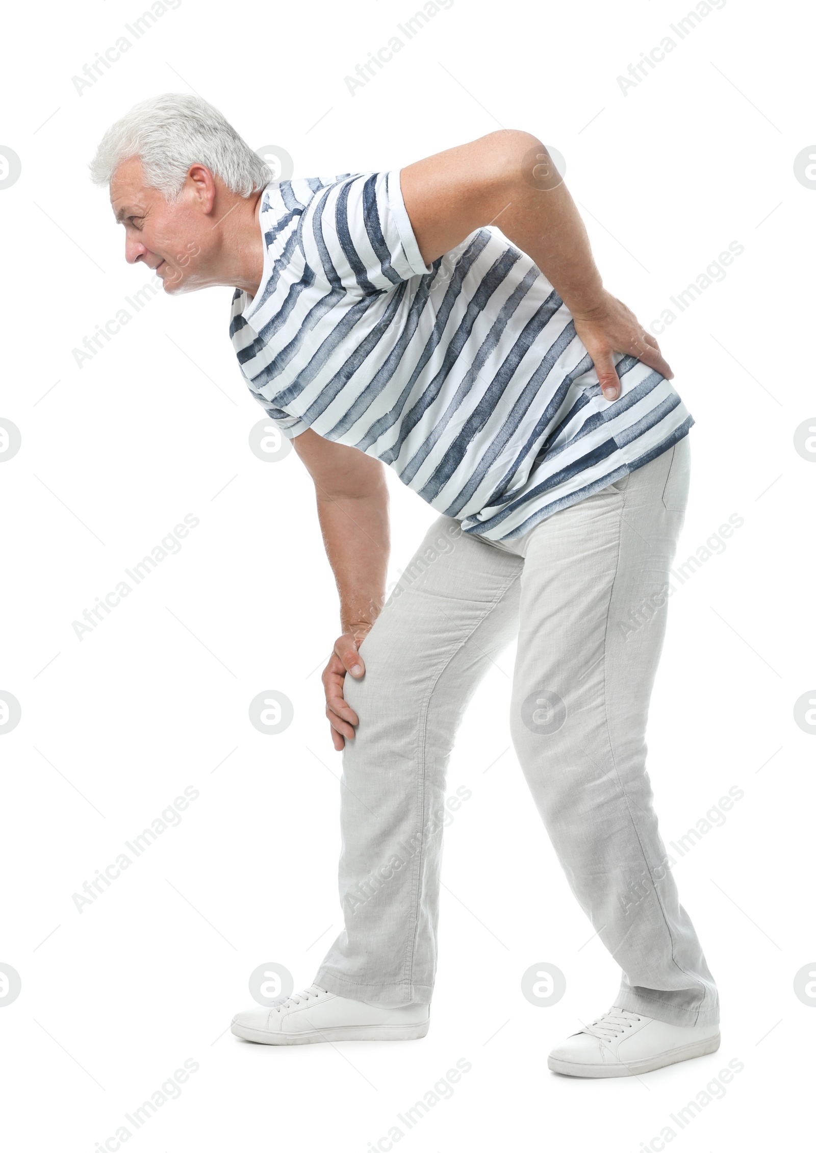 Photo of Full length portrait of senior man having knee problems on white background