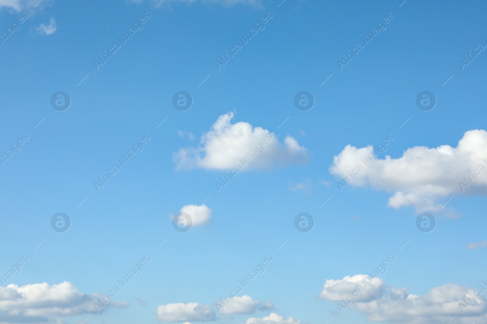 Photo of Picturesque view of blue sky with white clouds on sunny day