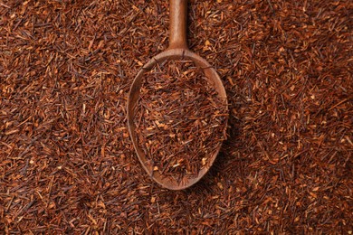 Photo of Rooibos tea and wooden spoon, top view