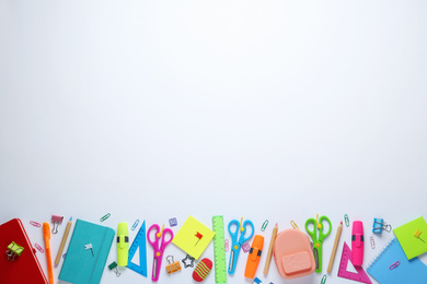Photo of Different school stationery on white background, top view