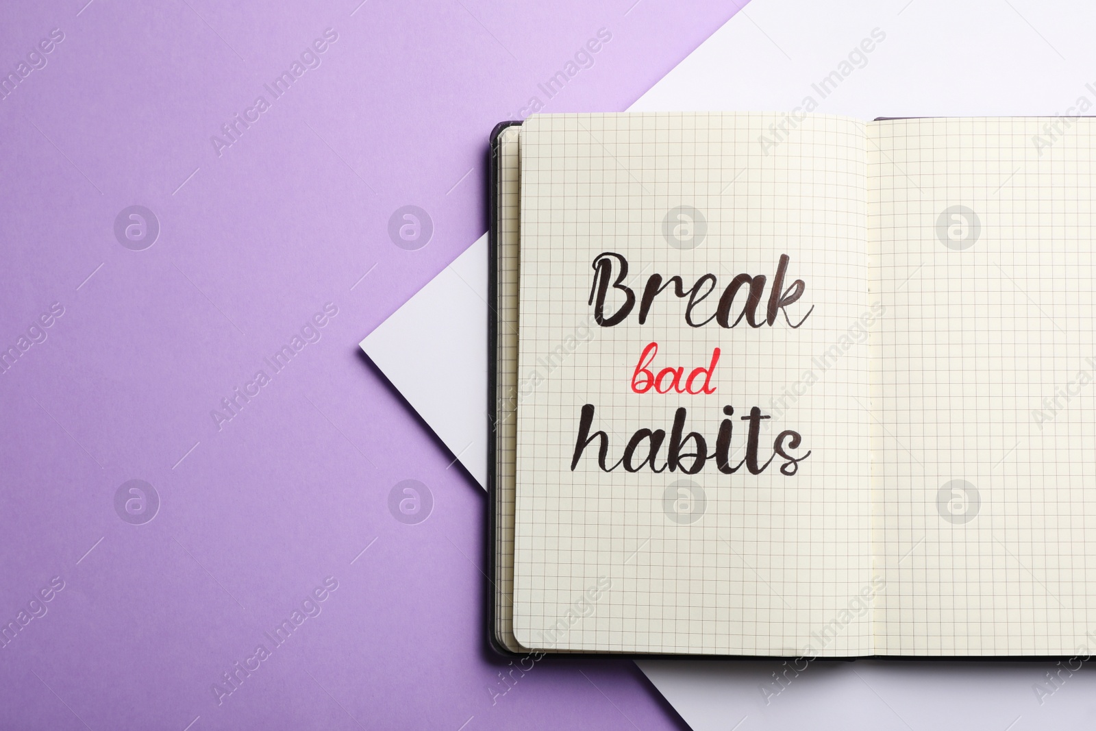 Photo of Open notebook with phrase Break bad habits on violet background, top view. Space for text