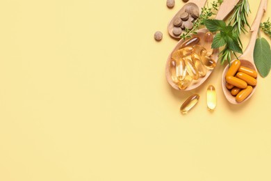 Photo of Different pills and herbs on light yellow background, flat lay with space for text. Dietary supplements