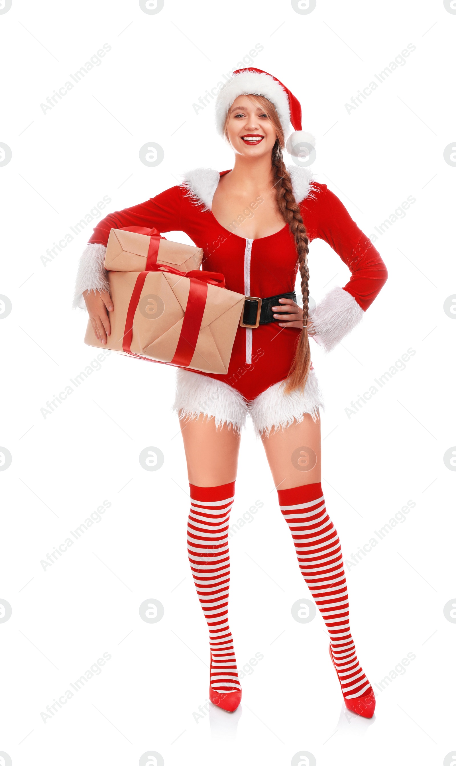 Photo of Beautiful Santa girl with Christmas gifts on white background