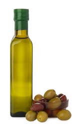 Photo of Vegetable fats. Olive oil in glass bottle and olives isolated on white