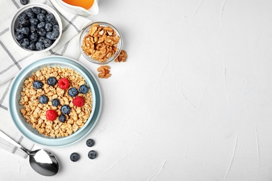 Photo of Tasty breakfast served on white table, flat lay. Space for text