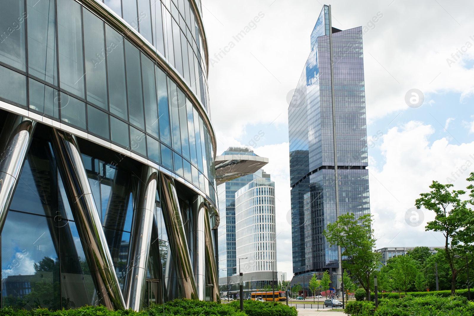 Photo of Beautiful buildings with many windows on cloudy day in city