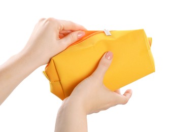 Woman with cosmetic bag isolated on white, closeup