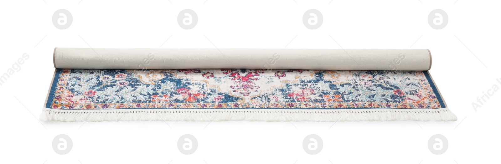 Photo of Rolled carpet with pattern on white background. Interior element