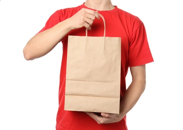 Photo of Man holding paper bag on white background. Food delivery service