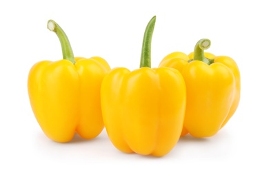 Photo of Ripe yellow bell peppers isolated on white