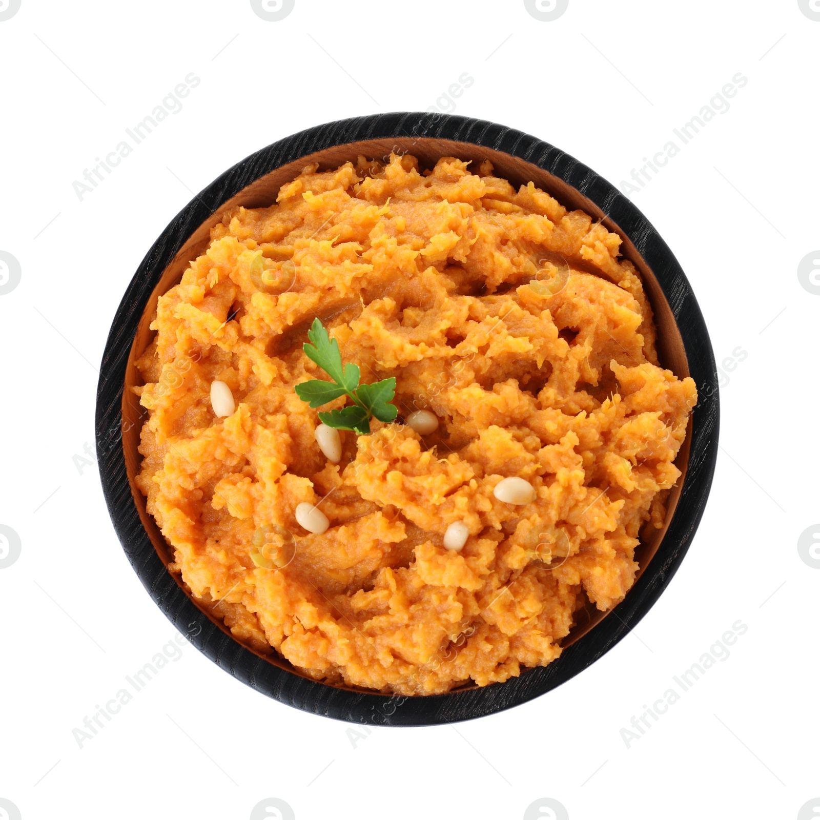 Photo of Plate with mashed sweet potatoes on white background, top view