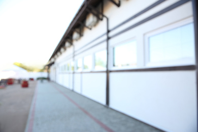 Blurred view of city street with building