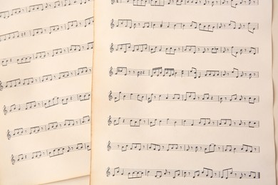 Photo of Sheets of paper with different notes as background, top view
