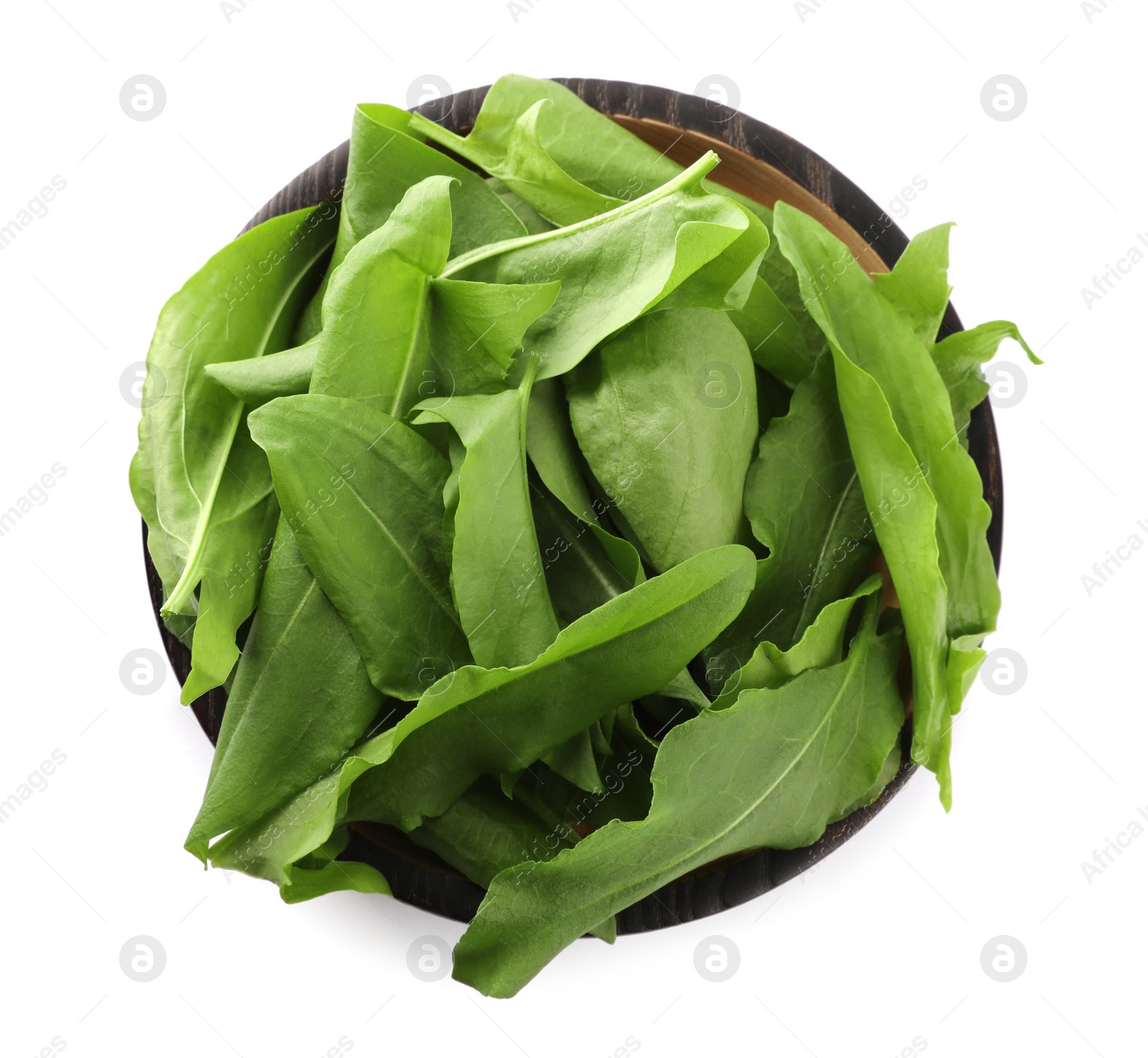 Photo of Fresh green sorrel leaves in bowl isolated on white, top view