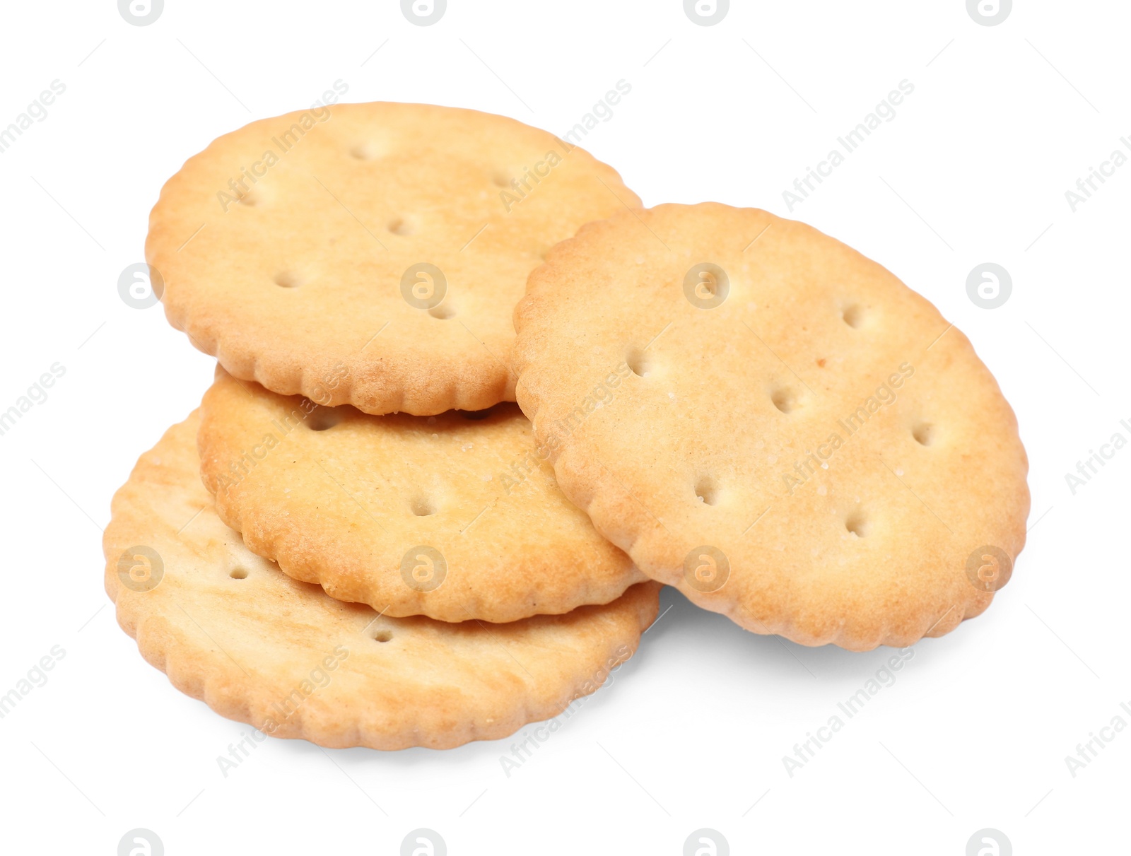 Photo of Many crispy crackers isolated on white. Delicious snack