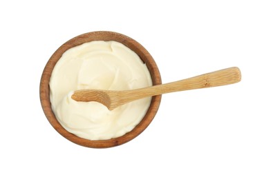 Photo of Bowl with mayonnaise sauce and spoon isolated on white, top view