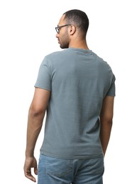 Man wearing t-shirt on white background, back view