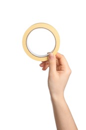 Photo of Woman holding beige adhesive tape on white background, closeup