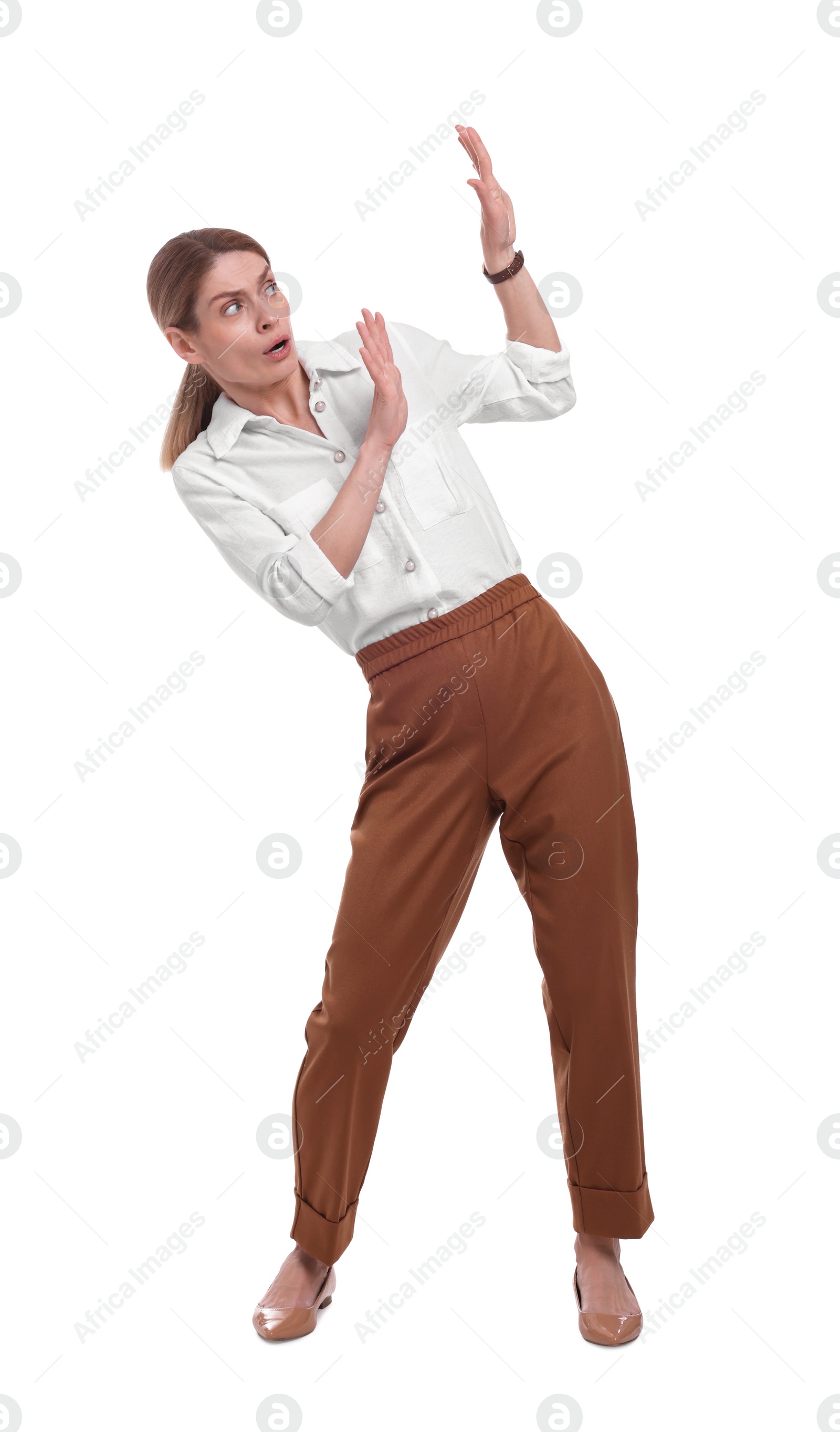 Photo of Beautiful businesswoman avoiding something on white background