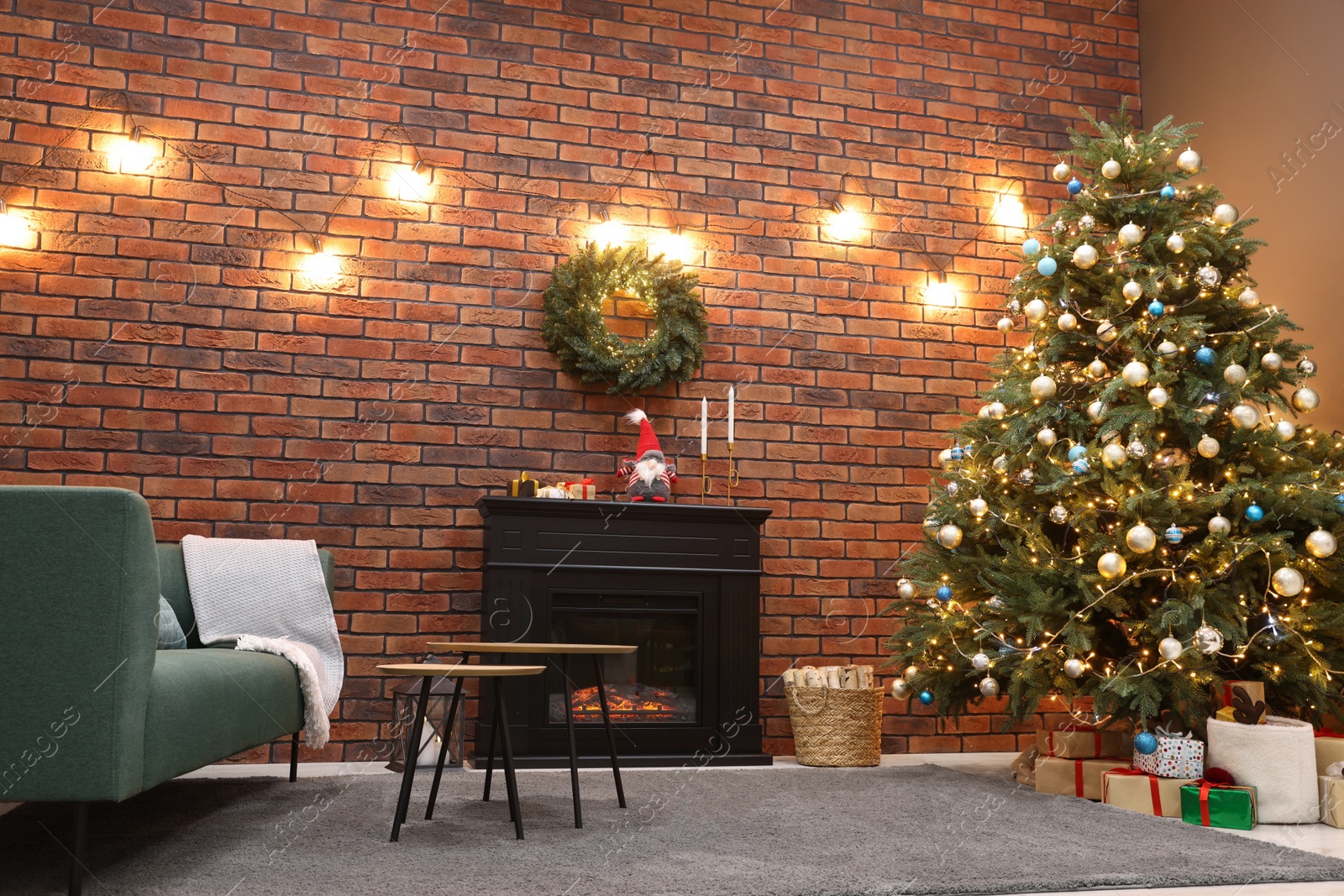 Photo of Beautiful tree with festive lights and Christmas decor in living room. Interior design