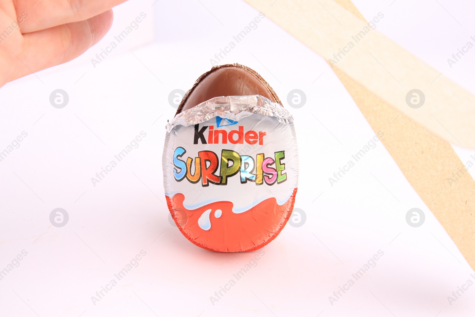 Photo of Sveti Vlas, Bulgaria - June 27, 2023: Unwrapped Kinder Surprise Egg isolated on white