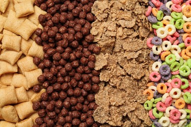 Different types of dry breakfast as background, top view