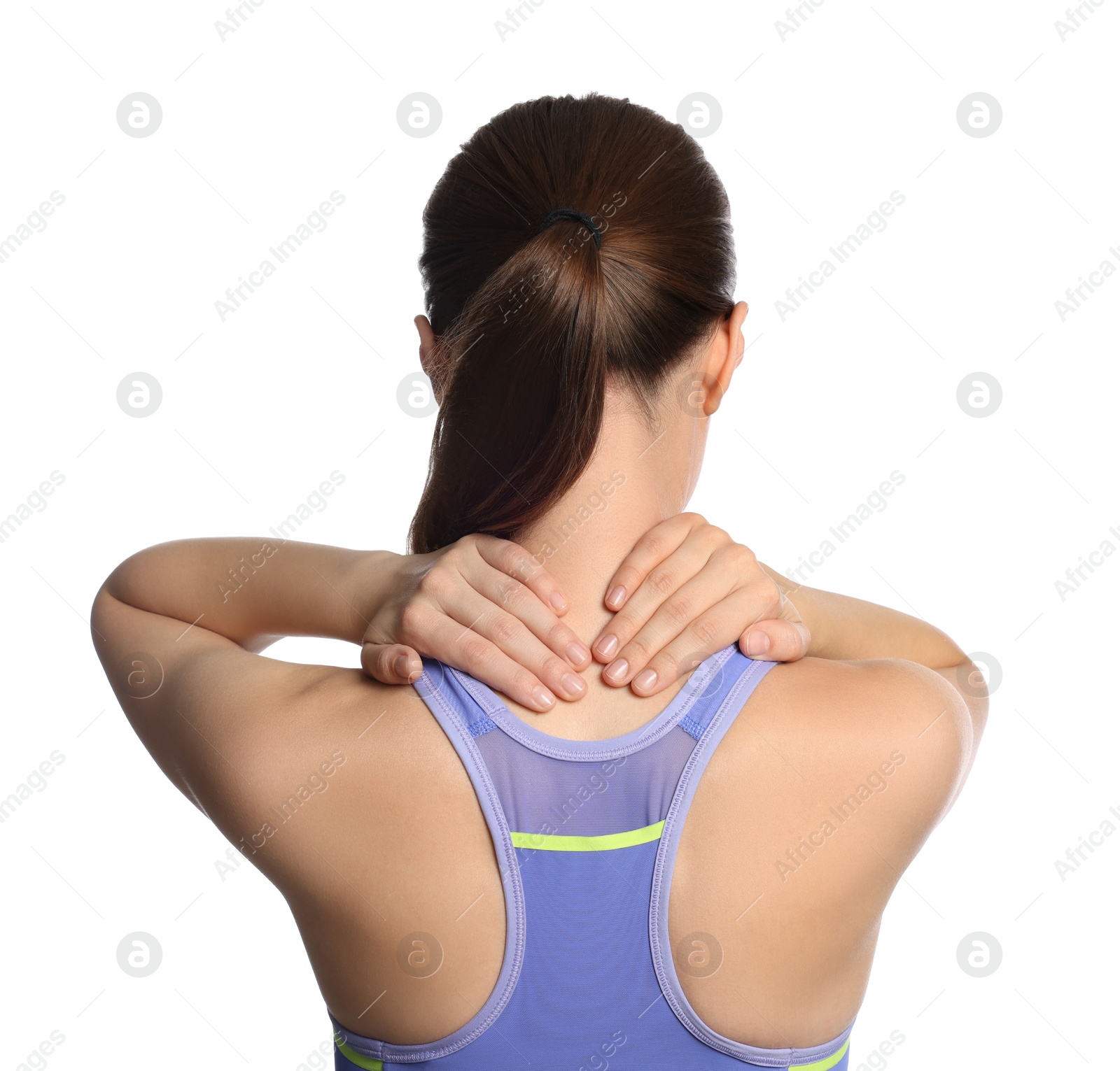 Photo of Young woman suffering from neck pain on white background, back view