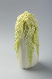 Photo of Fresh ripe Chinese cabbage on light grey background