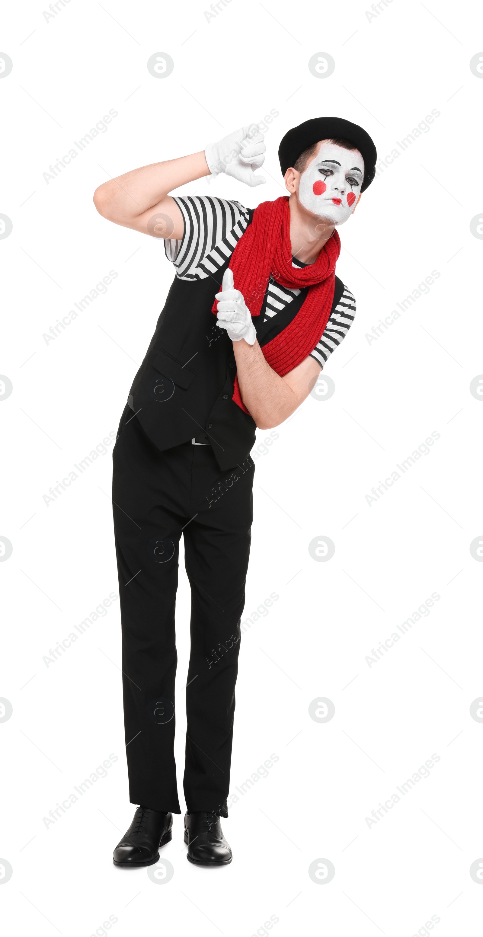 Photo of Funny mime artist in beret posing on white background