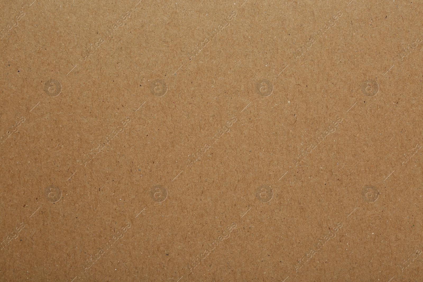 Photo of Kraft paper notebook sheet as background, top view