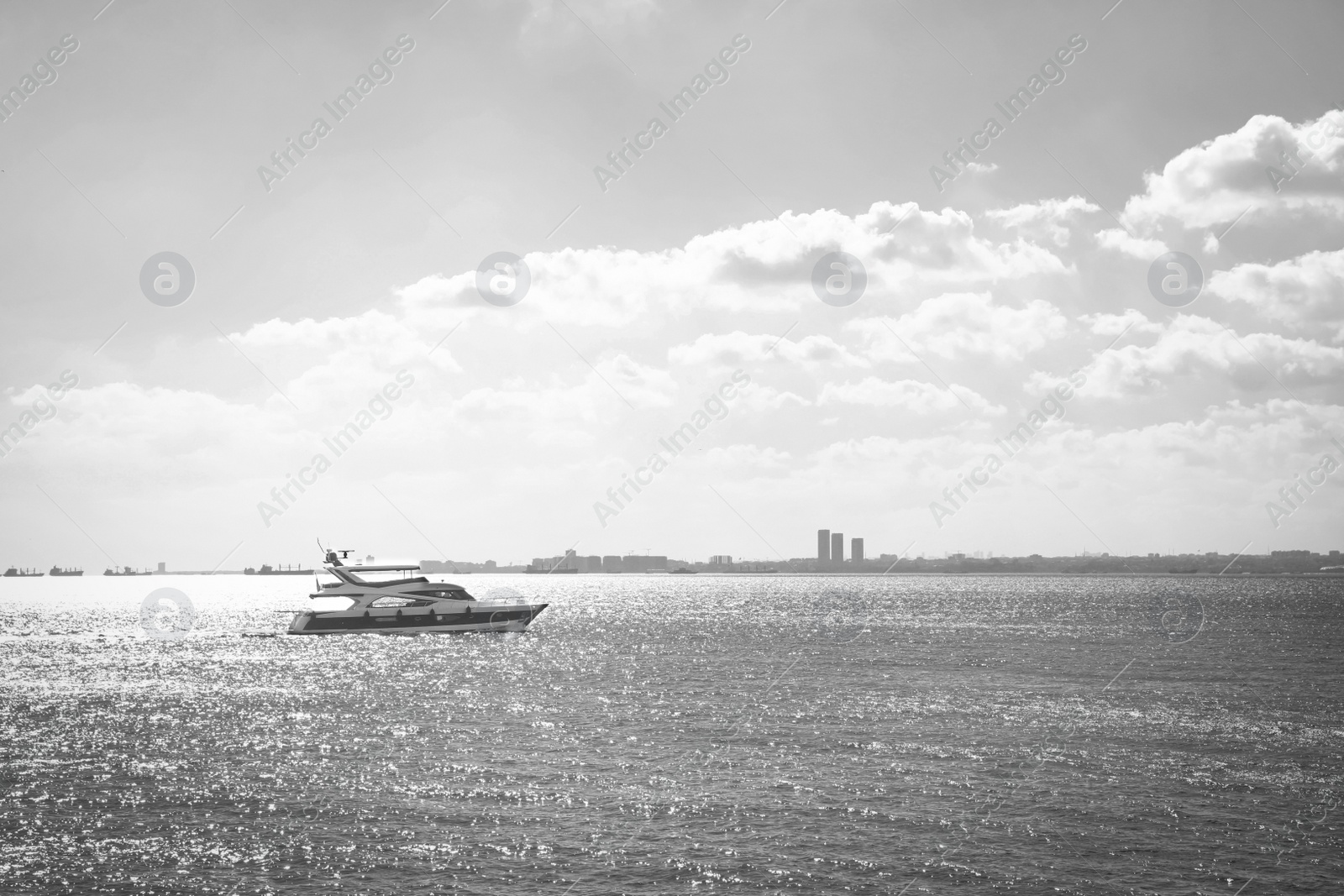 Image of Beautiful sea with motorboat. Black and white tone 