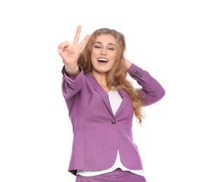 Photo of Happy young businesswoman showing victory gesture on white background