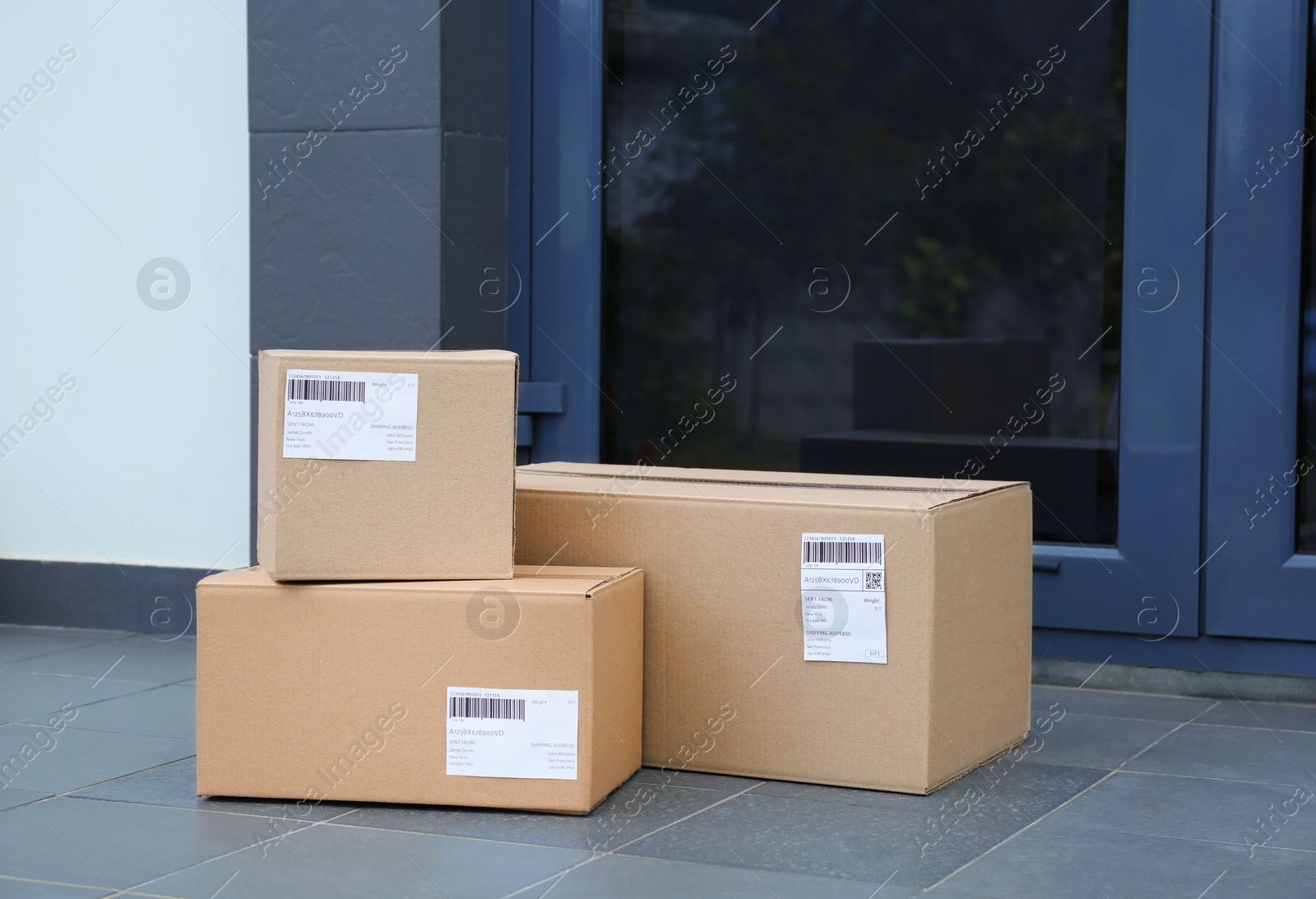 Photo of Parcel boxes on floor near office entrance