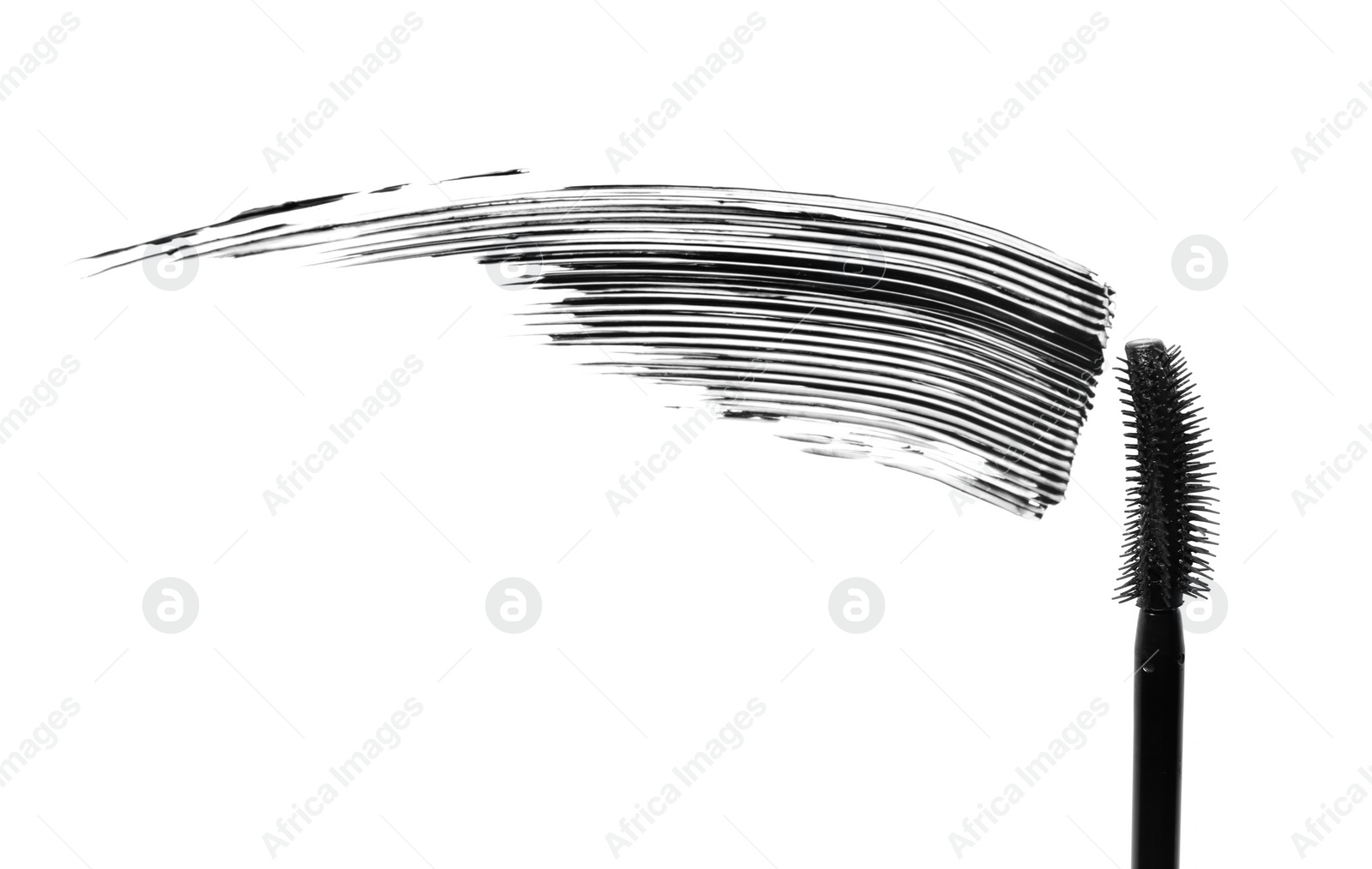 Photo of Smear of black mascara and applicator isolated on white, top view