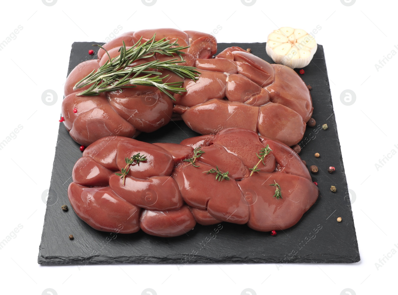 Photo of Fresh raw kidneys with seasonings on white background