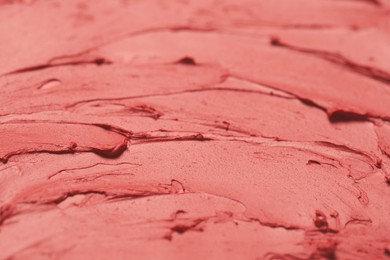 Photo of Texture of red lipstick as background, closeup