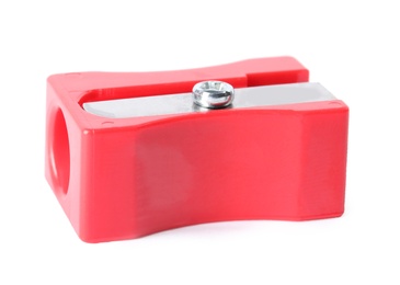 Image of Bright red pencil sharpener isolated on white. School stationery